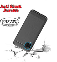 VAKIBO Carbon Fiber Brushed Black Coloured Soft TPU Back Cover Case With Camera Protection Ring Suitable for Samsung Galaxy F12
